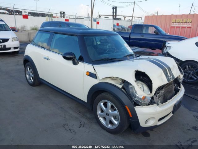 2009 MINI COOPER WMWMF33519TU75111